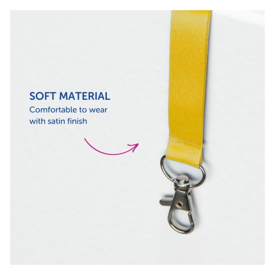 Billedet viser et gult nøglesnor lavet af blødt materiale med en satinfinish. Den har en metalclips til fastgørelse og fremhæver komfort ved brug.
