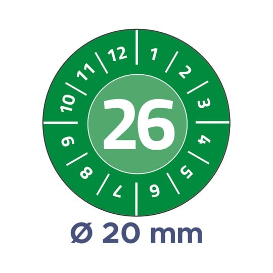 Billedet viser en cirkulær skive med en grøn baggrund, der viser tallet 26 i midten. Omkring midten er der numre fra 1 til 12. Under skiven er der en etiket, der angiver en diameter på 20 mm.