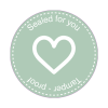 Rund forseglingsetiket med et stort hjerte i midten og med teksten "Sealed for you Tamper - proof"